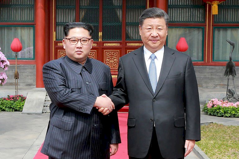 中國官媒：習近平接待金正恩來訪